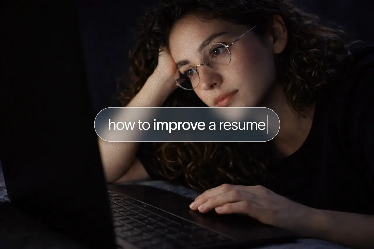 Person looking at a laptop, with a search bar reading "how to improve a resume."